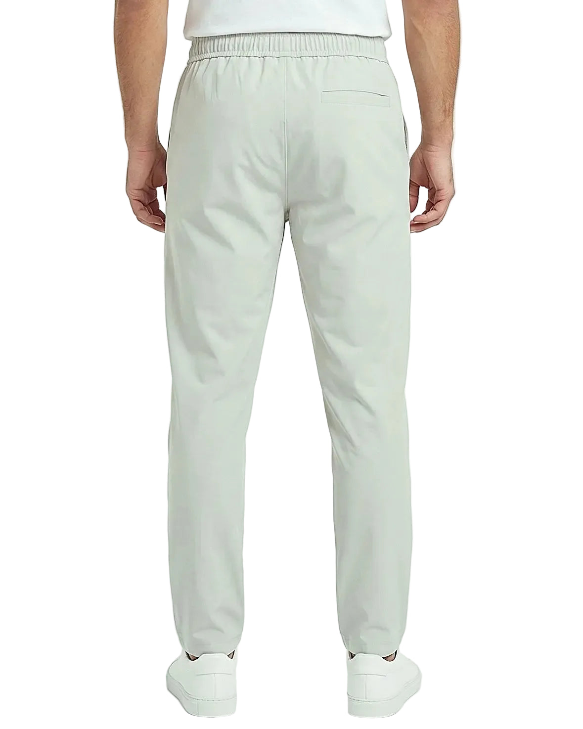 Back view of a men's beige regular-fit sarouel pants featuring an elastic waistband and structured pockets by TREE.