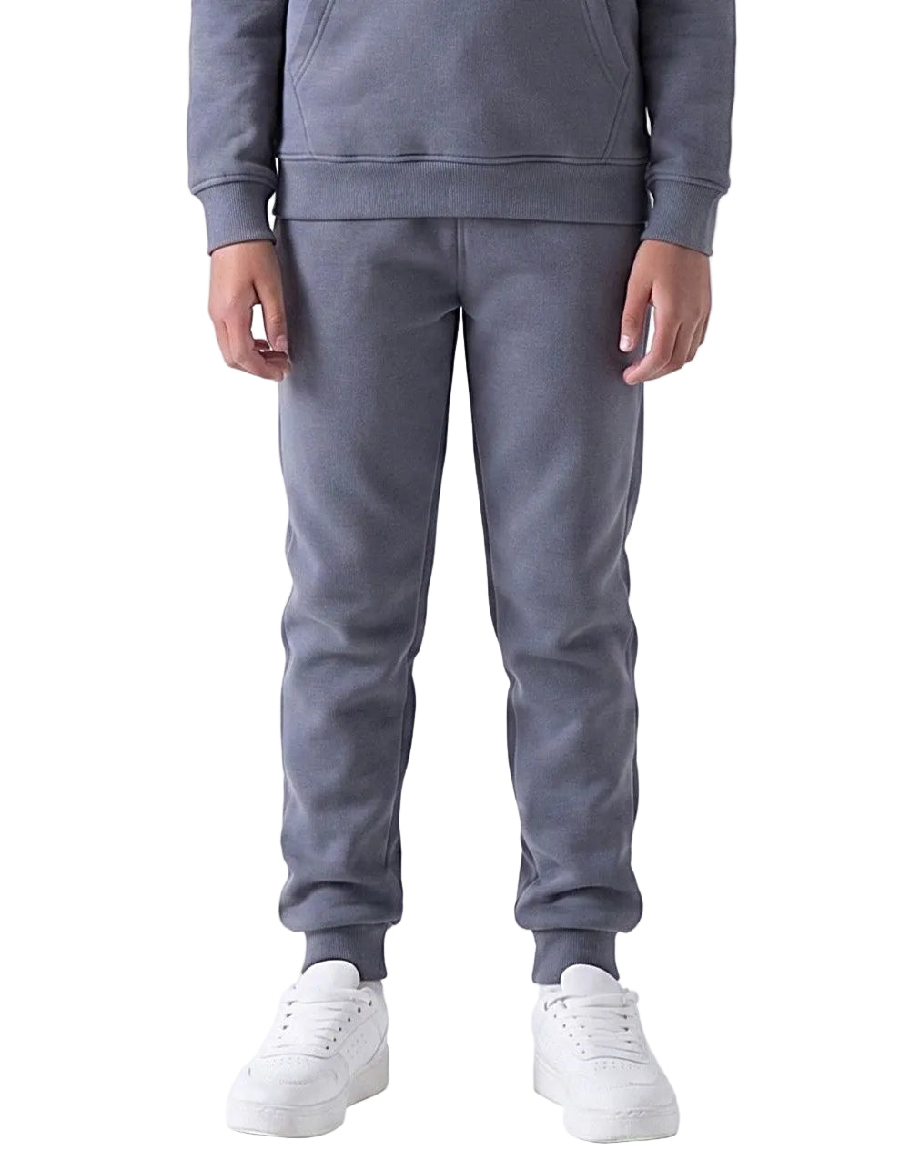 Front view of a young girl wearing dark grey milton pants in a relaxed fit by TREE.