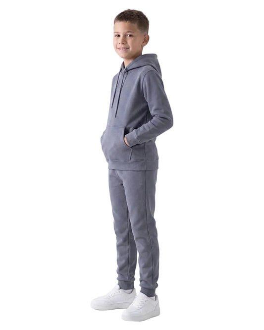 Front view of a boy wearing a dark grey milton hoodie in a relaxed fit by TREE.