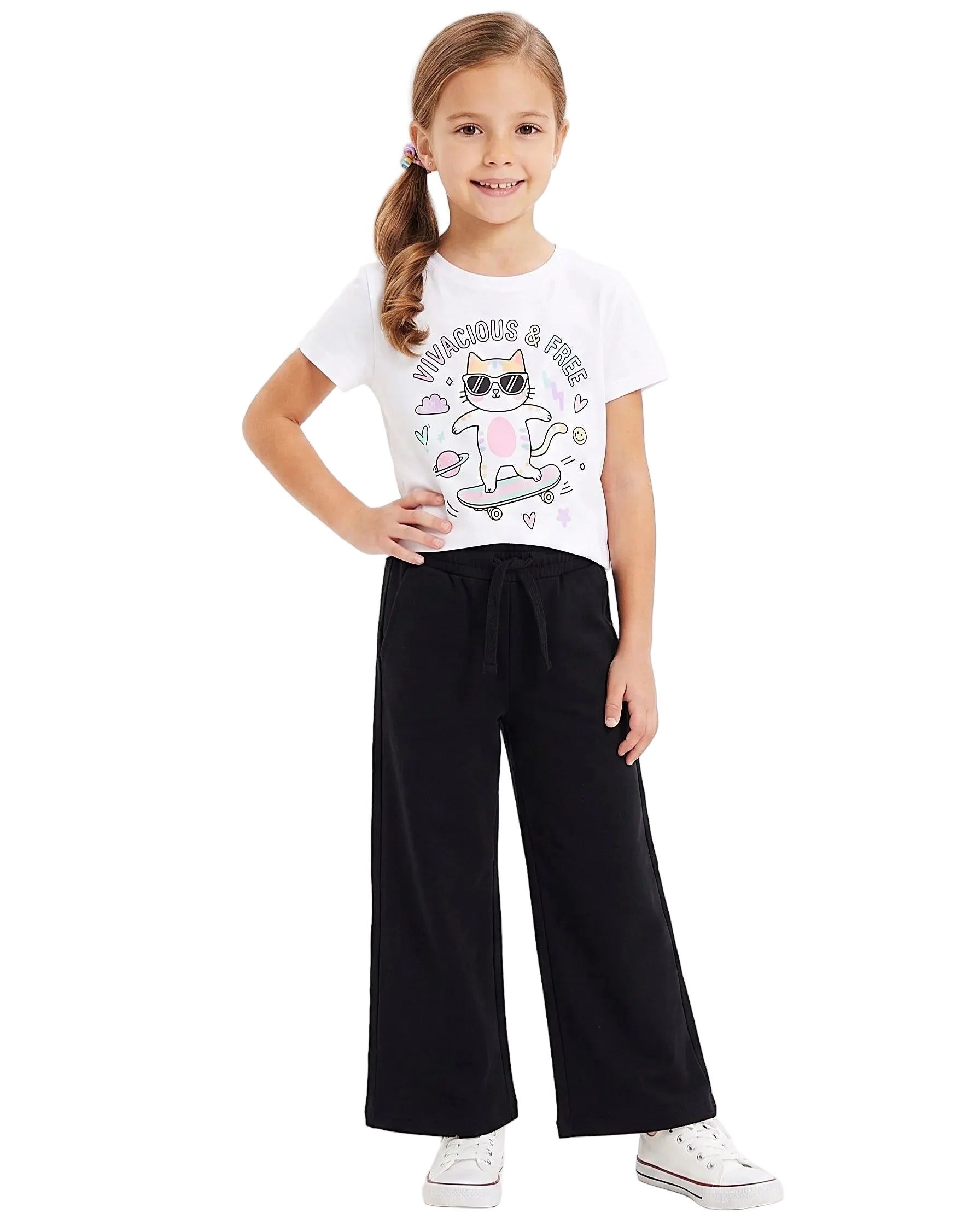Front view of a young girl wearing girls' summer wide-leg pants featuring an elastic waist and drawstring tie by TREE.