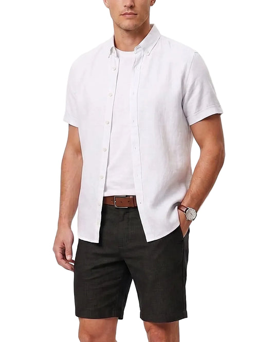 Front view of a model wearing a men's summer short-sleeve button-down shirt in a regular fit by TREE.