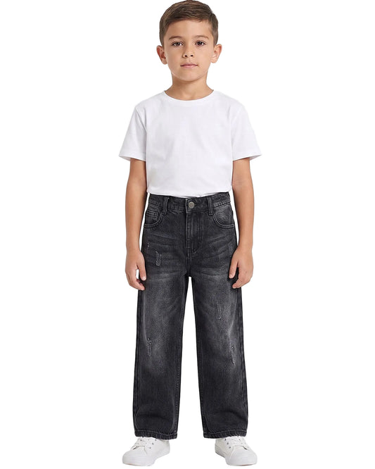 Front view of a boy wearing kids' wide-leg jeans in a classic wash by TREE.