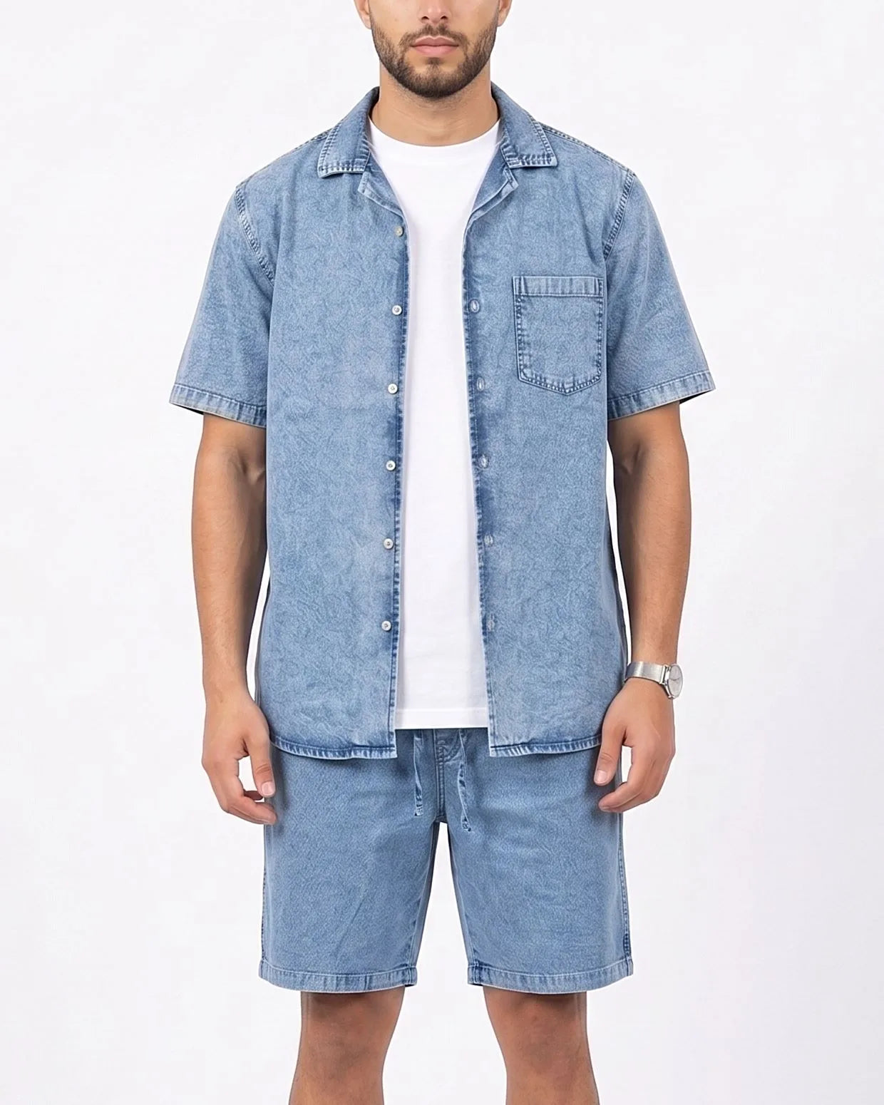 Front view of a model wearing men's 100% cotton denim shorts with an elastic waist by TREE.