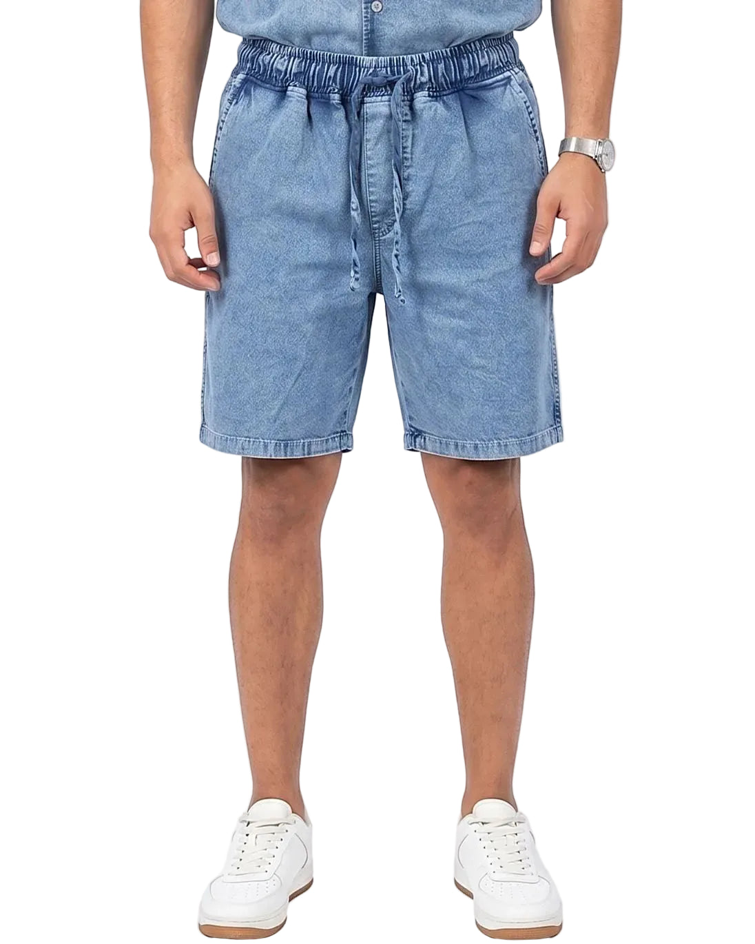 Front view of a model wearing men's 100% cotton denim shorts with an elastic waist by TREE.