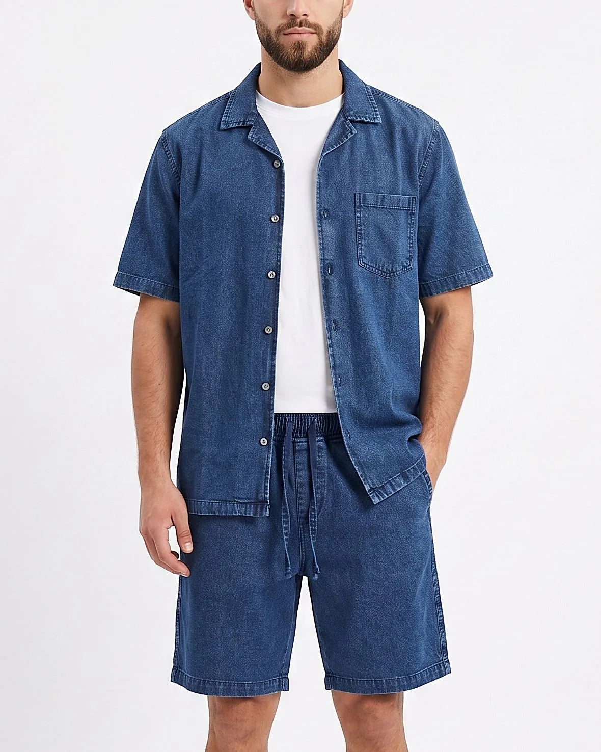 Front view of a model wearing men's 100% cotton denim shorts with an elastic waist by TREE.