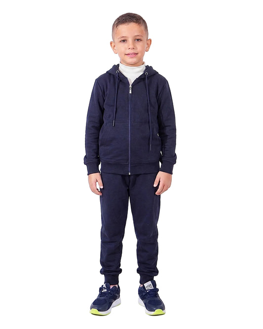 Boy wearing boys' solid navy blue Summer Milton sweatpants by TREE