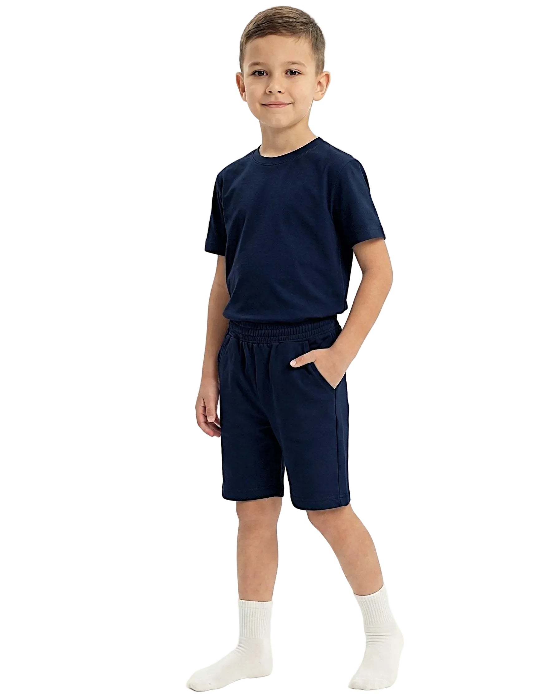 Front view of a boy wearing a kids' summer 100% cotton t-shirt and shorts outfit set by TREE.