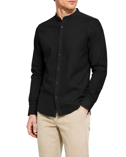 Front view of a man wearing a long-sleeve henry collar shirt by TREE.