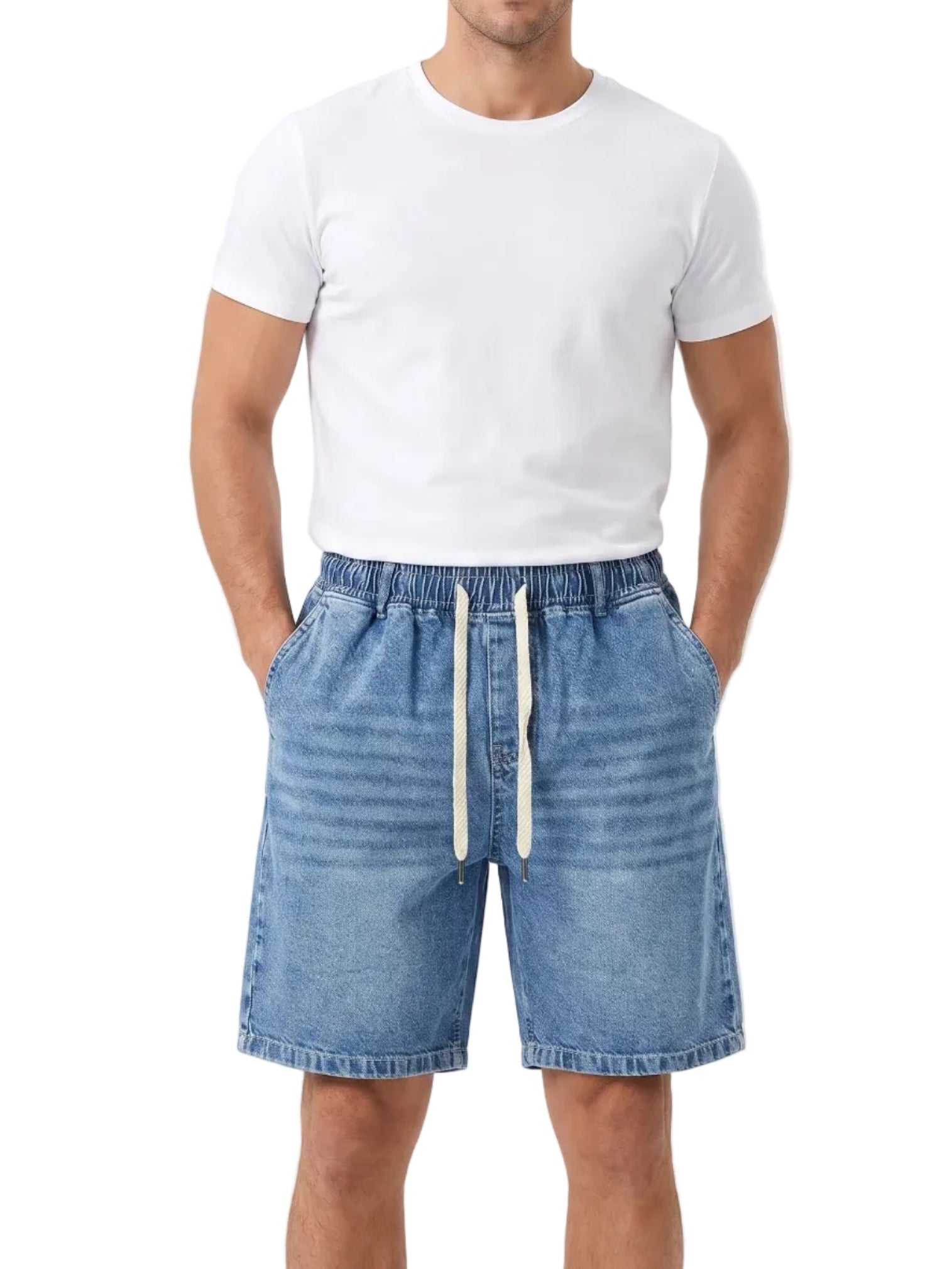 Front view of a man wearing oversized denim shorts by TREE.