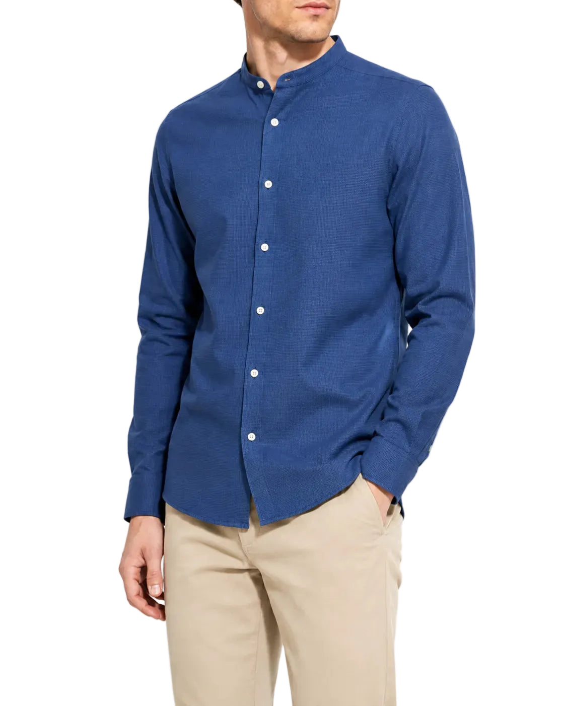 Front view of a man wearing a long-sleeve henry collar shirt by TREE.