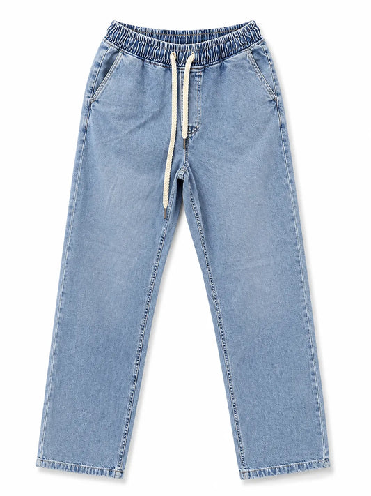 Front view of men's wide-leg denim pants by TREE.