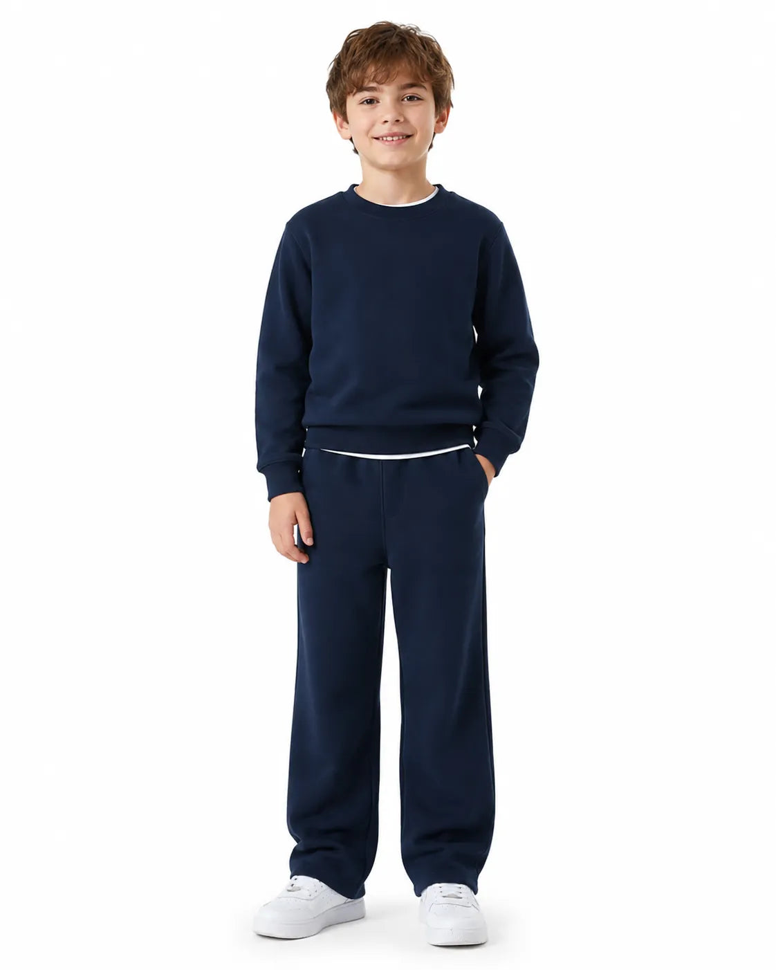 Front view of a boy wearing navy blue summer milton wide-leg sweatpants (90% cotton & 10% polyester) paired with a matching crewneck by TREE.