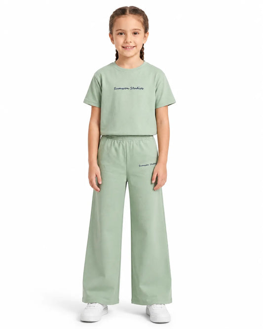 TREE girls mint wide leg 100% cotton sweatpants with elastic waistband and small front text detail