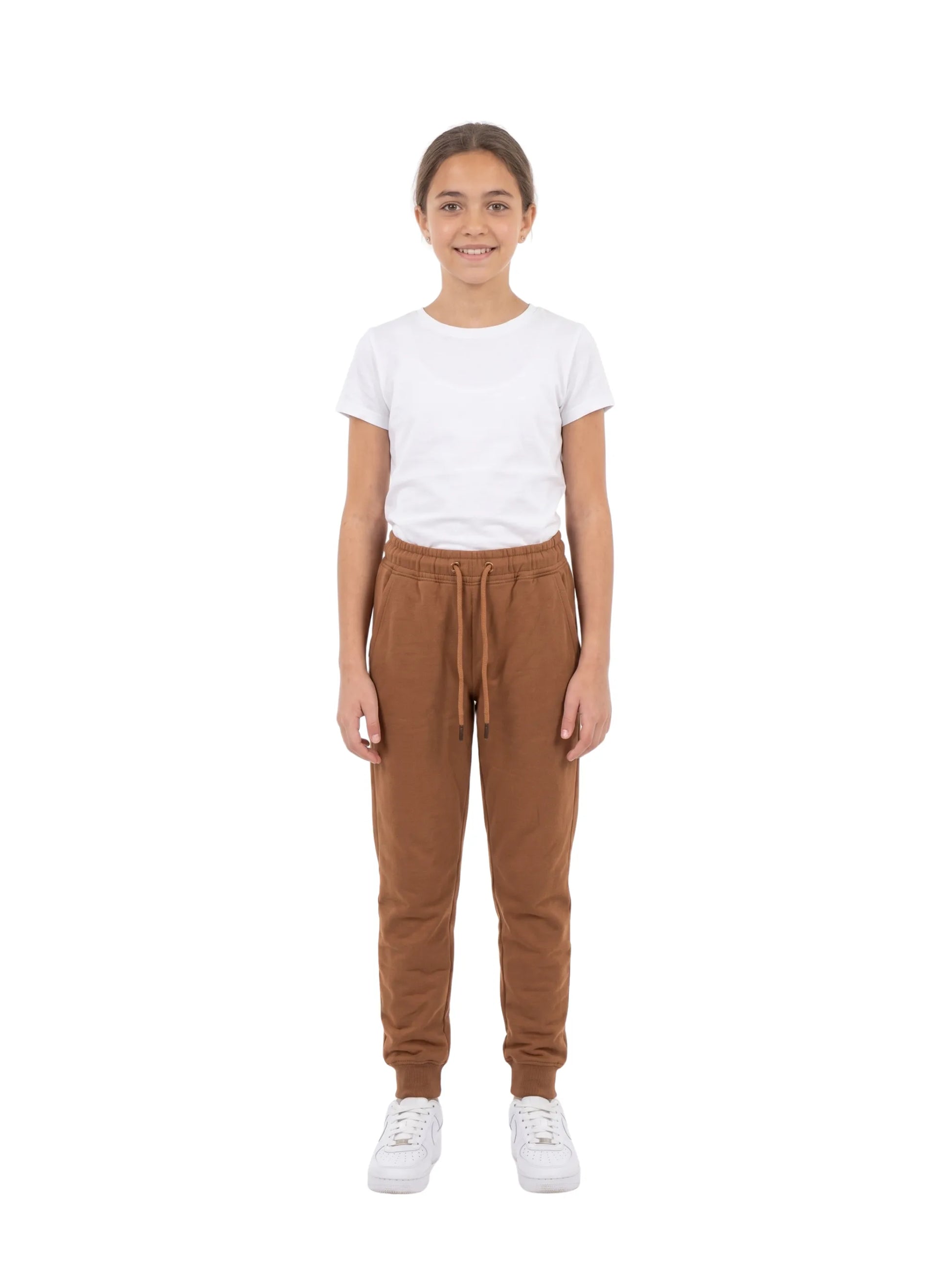 Close-up of the elastic waistband and drawstring on TREE's girls' brown sweatpants