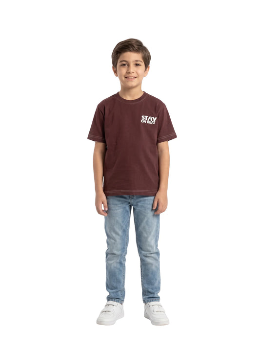 Boys' casual burgundy t-shirt with visible texture and STAY ON BEAT chest print from TREE