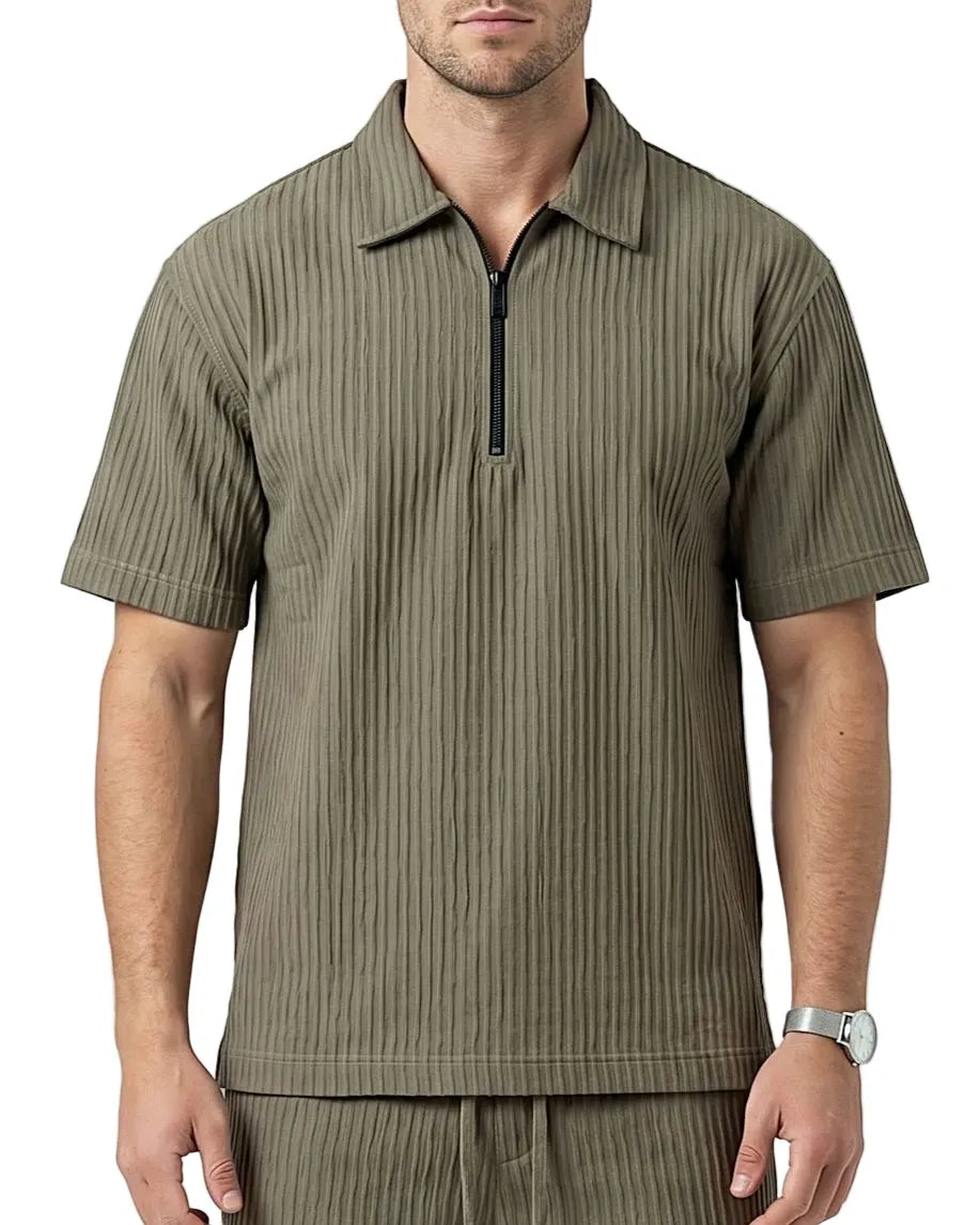 Front view of a man wearing a Olive pleated zip polo shirt