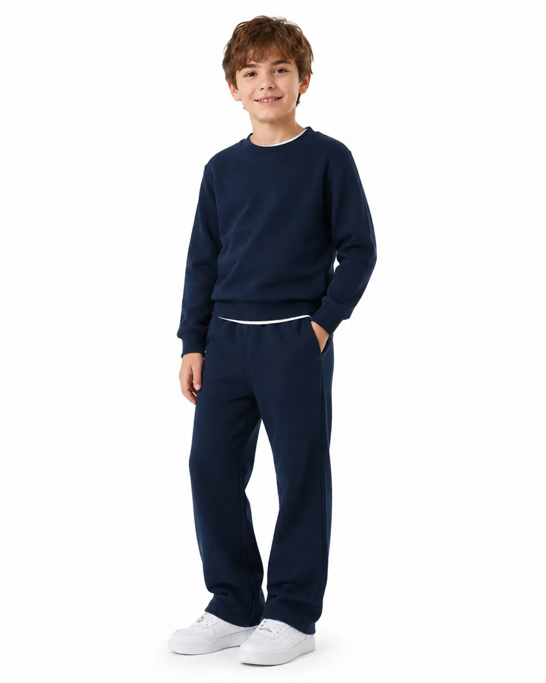 Front view of a boy wearing navy blue summer milton wide-leg sweatpants (90% cotton & 10% polyester) paired with a matching crewneck by TREE.
