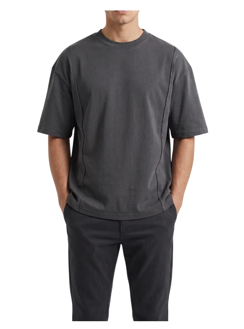Front view of a man wearing a dark grey oversize fashion t-shirt by TREE