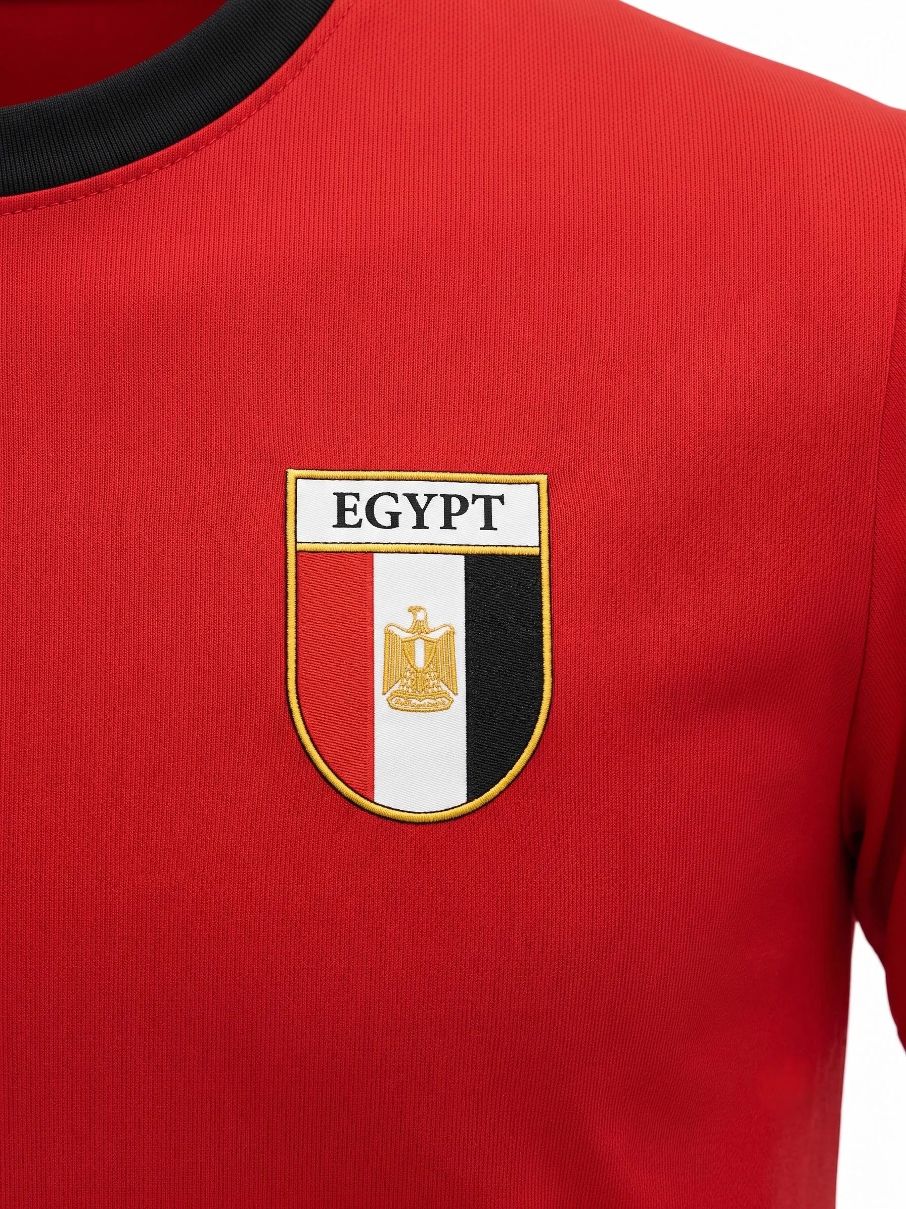 Front view of a man wearing an Egypt sports t-shirt in white and red by TREE.