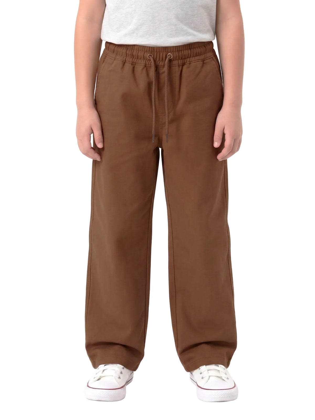 Front view of a child wearing brown kids' wide leg sweatpants with side pockets and a drawstring waist by TREE.