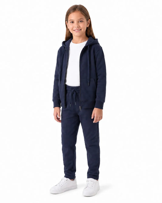 Young girl modeling a Girls' Navy Milton Zip Hoodie and matching sweatpants