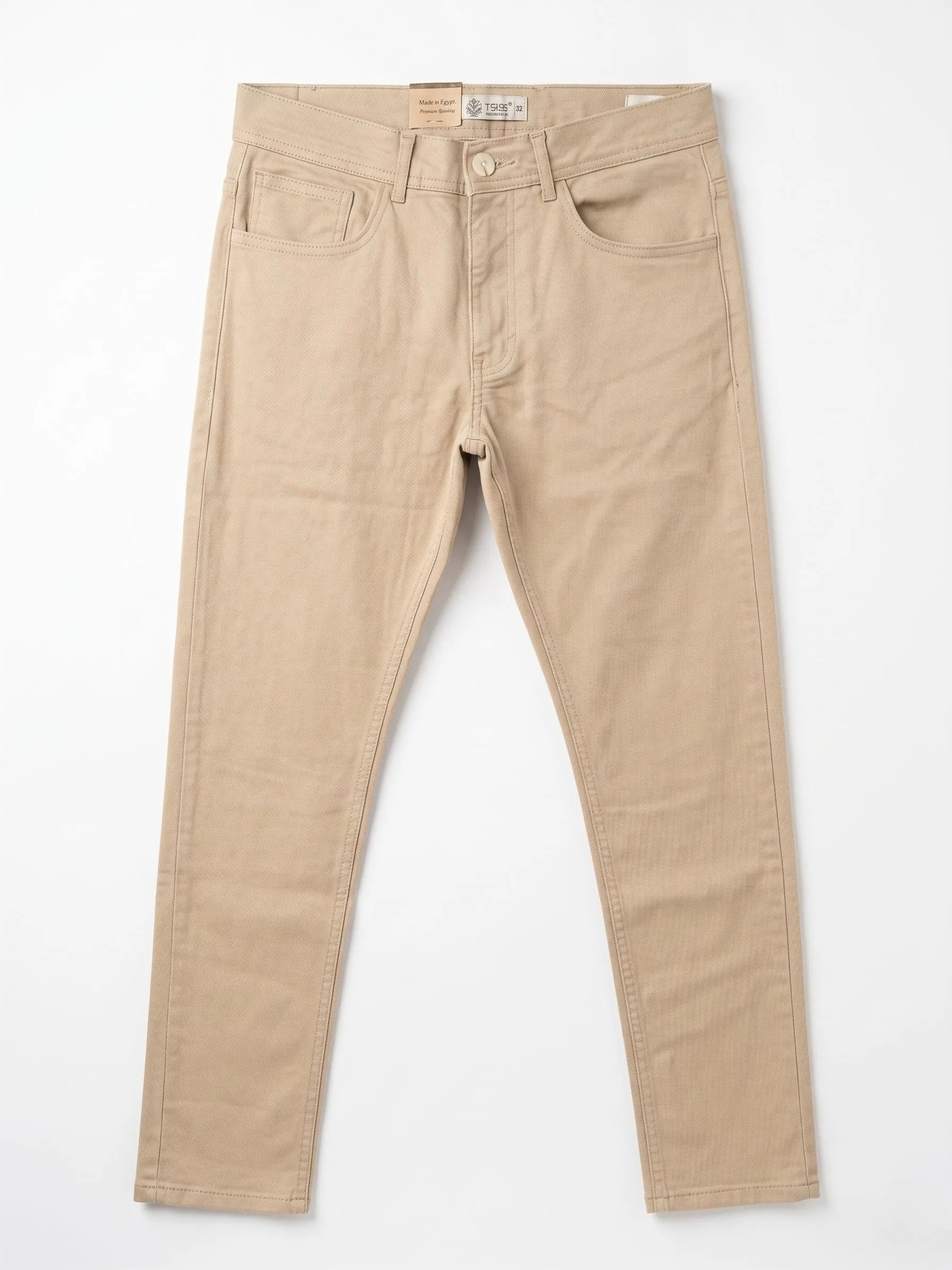 Studio shot of men's slim-fit 5-pocket gabardine pants in beige by TREE.