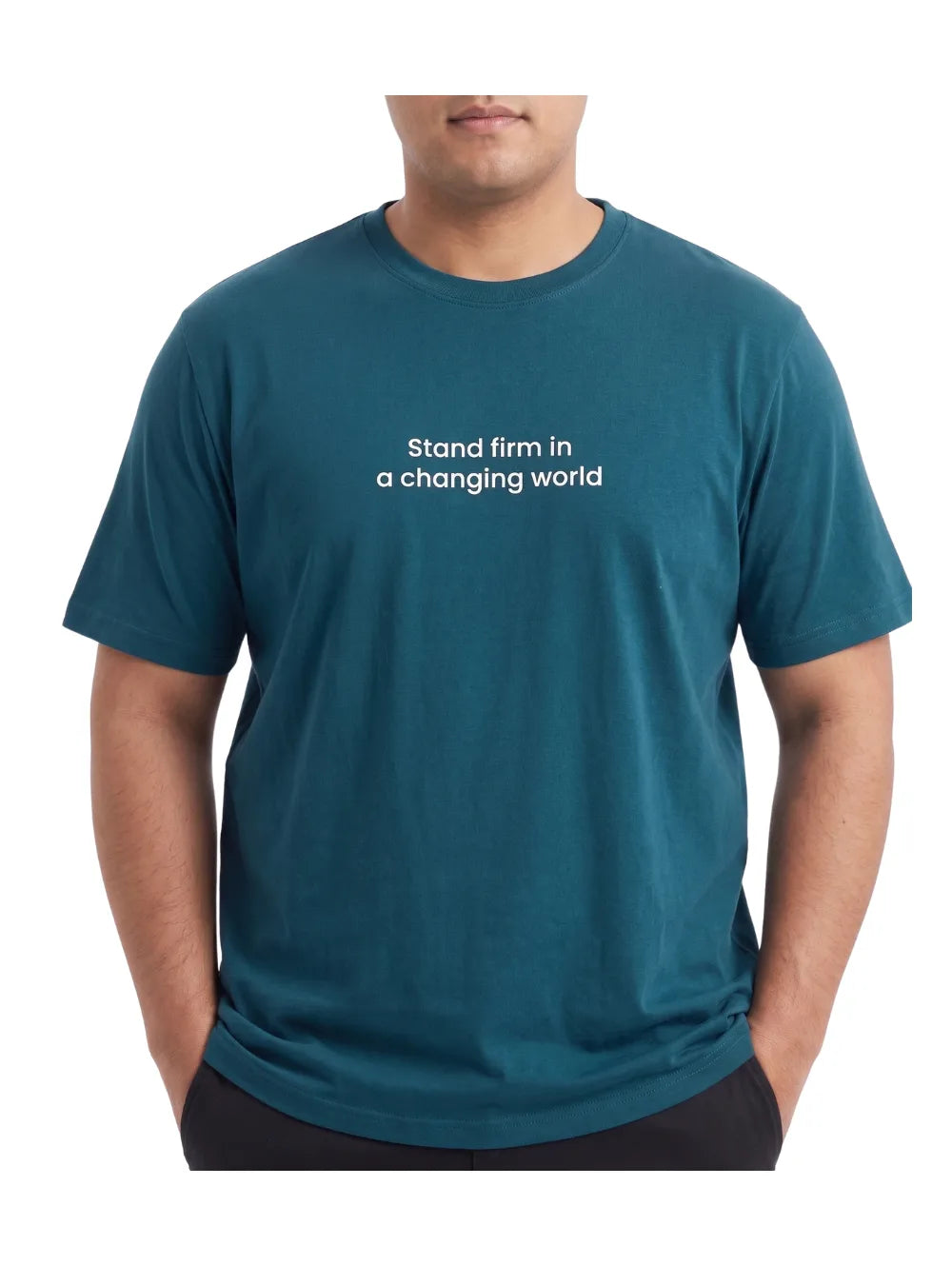 Front view of a man wearing a big size petroleum t-shirt with "Stand firm" print by TREE.