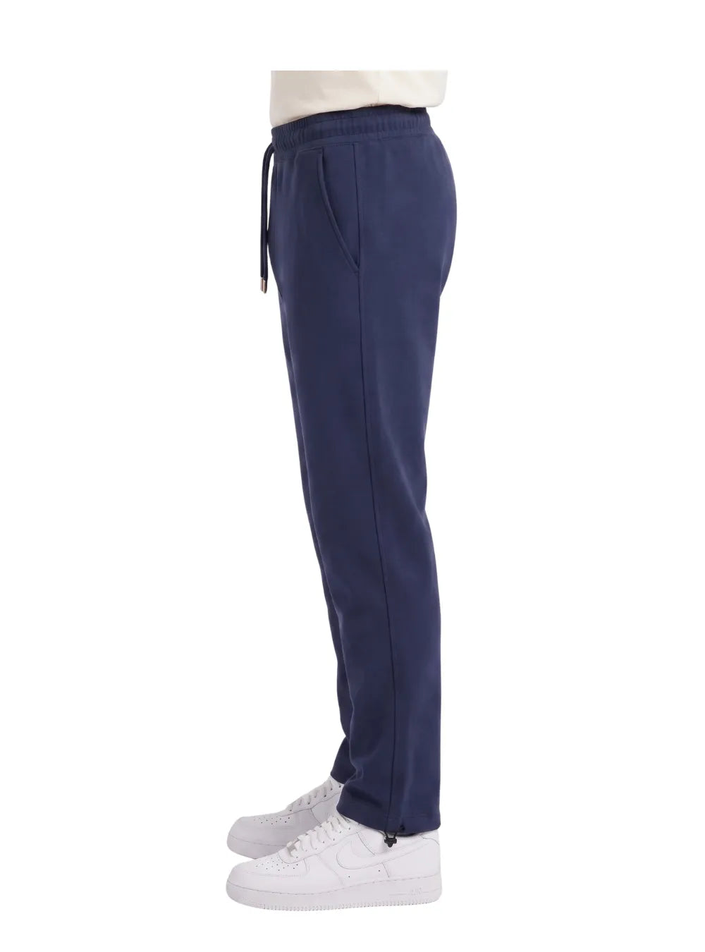 Front view of a man wearing wide-leg sweatpants in navy by TREE