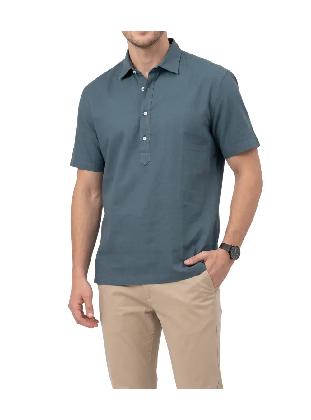 Front view of a man wearing a casual petrol half-button textured shirt by TREE.