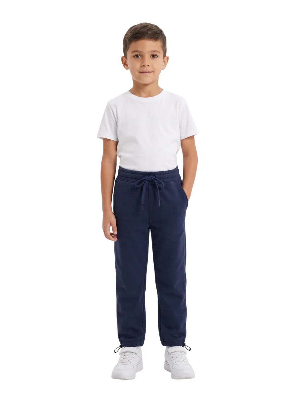 Front view of a young boy wearing solid navy sweatpants and a white t-shirt by TREE