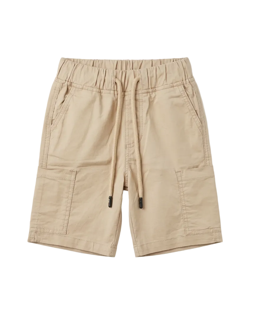 Boys beige shorts with an elastic waistband and side cargo pockets from TREE store.