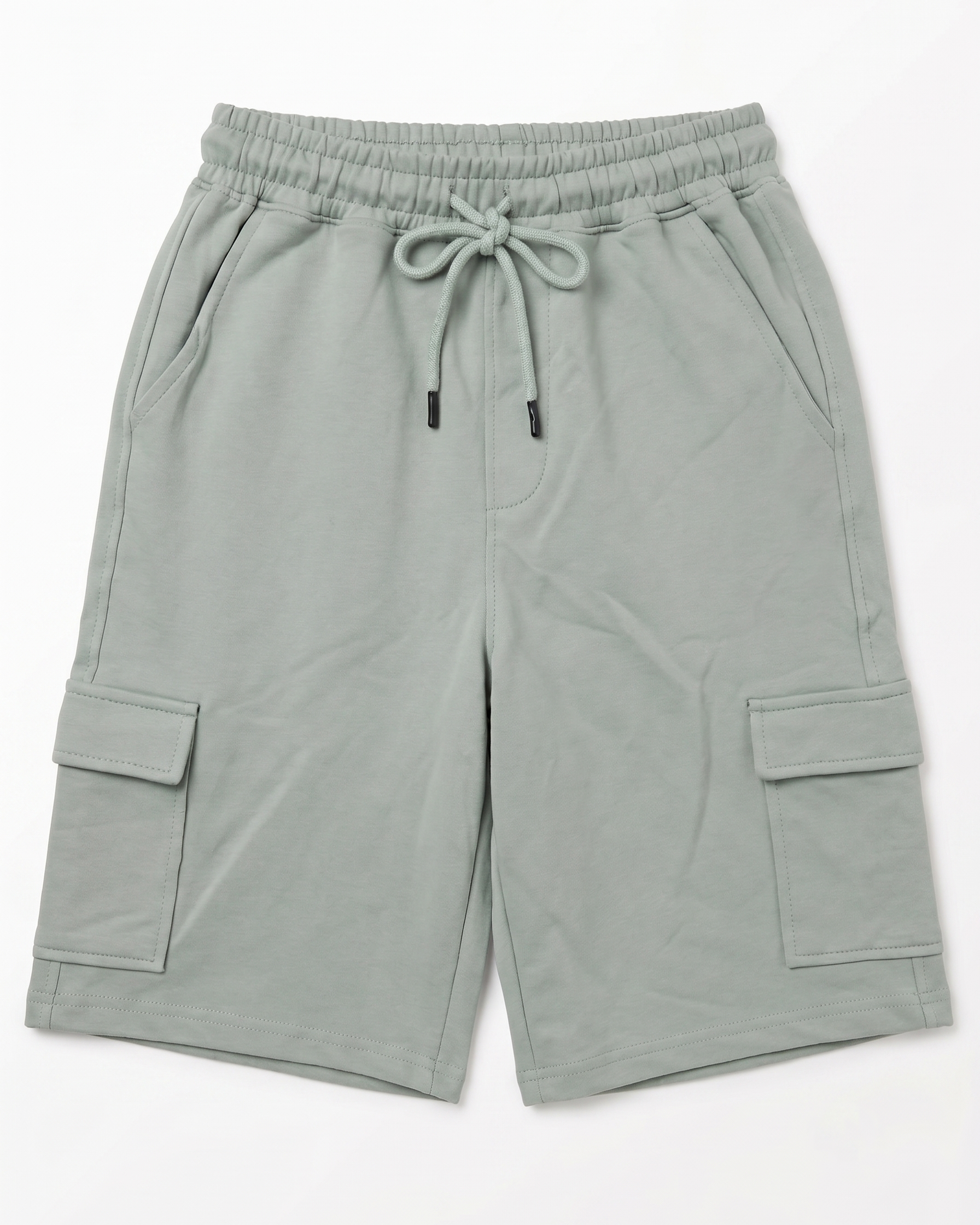 Boys mint shorts with an elastic waistband and side cargo pockets from TREE store.