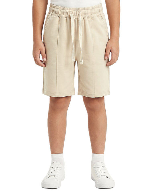 Boys solid shorts with an elastic waistband and drawstring from TREE store.