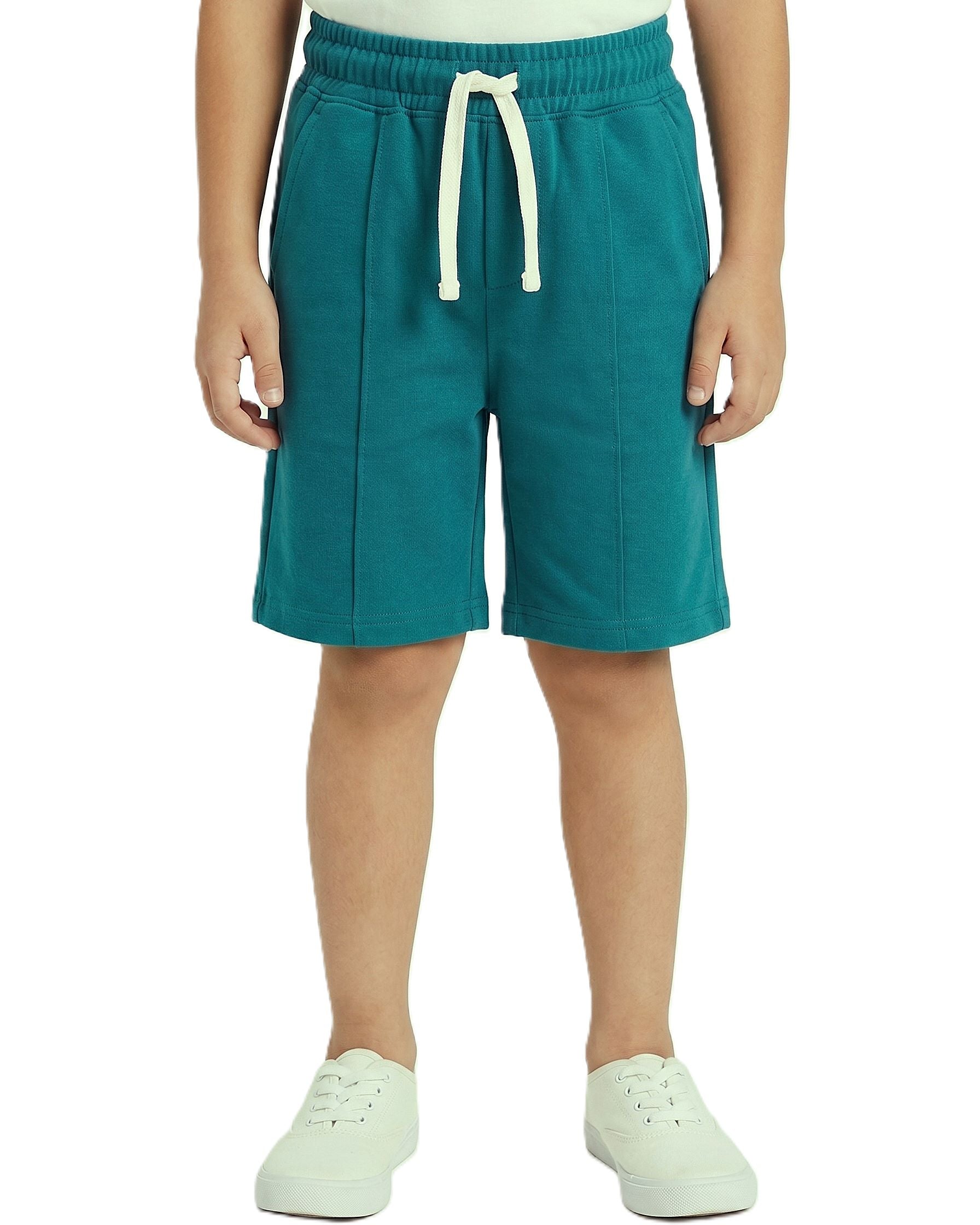 Boys solid shorts with an elastic waistband and drawstring from TREE store.