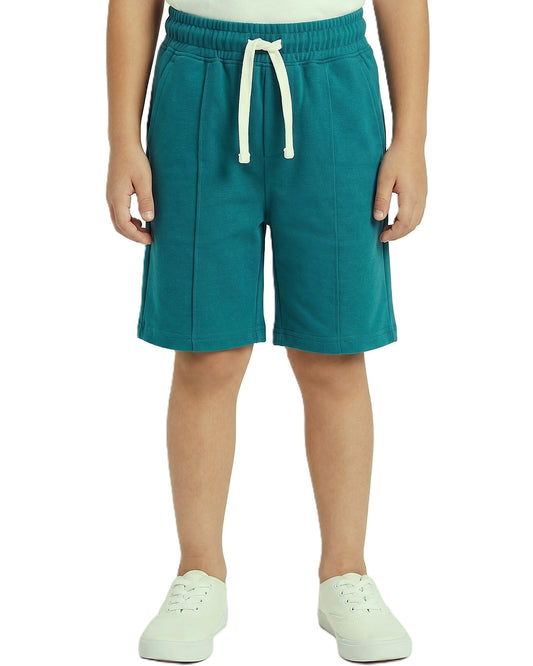 Boys solid shorts with an elastic waistband and drawstring from TREE store.