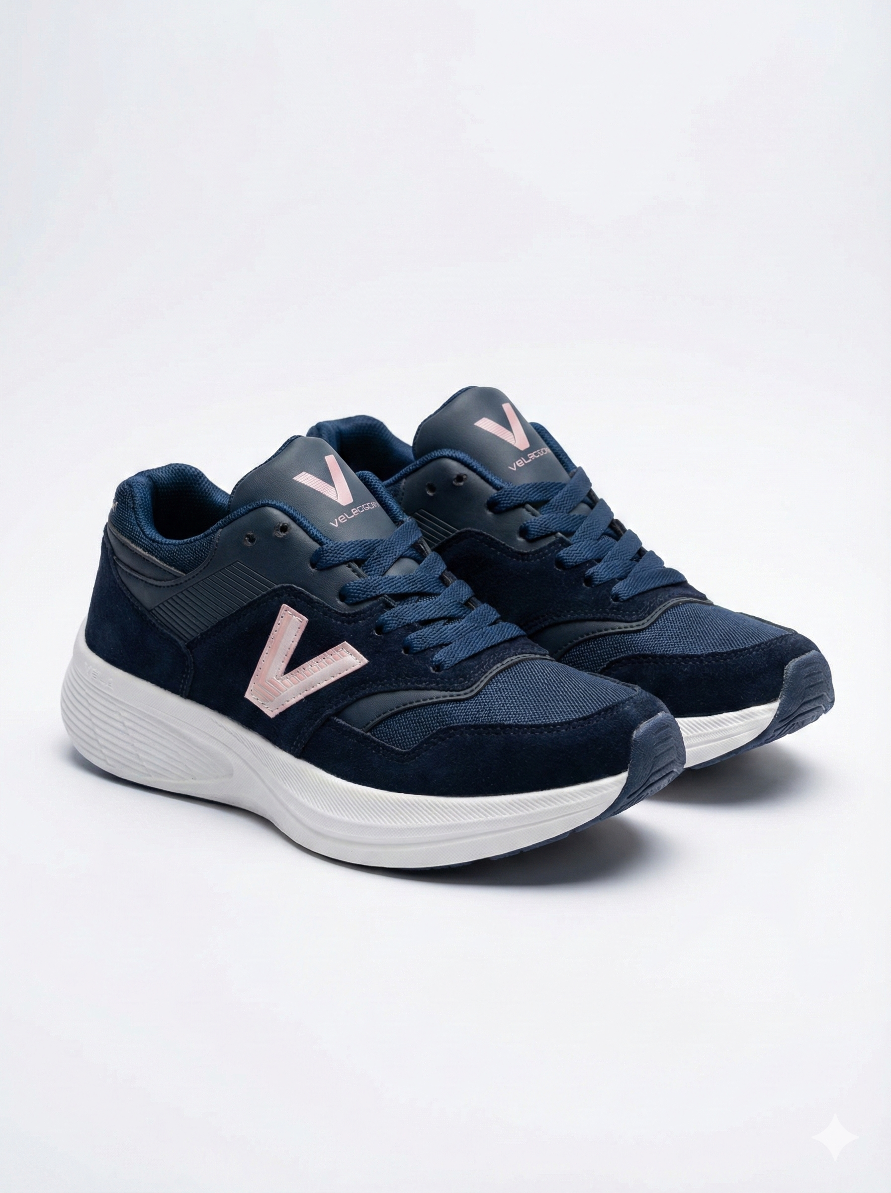 Navy blue sneakers with a logo on a white background