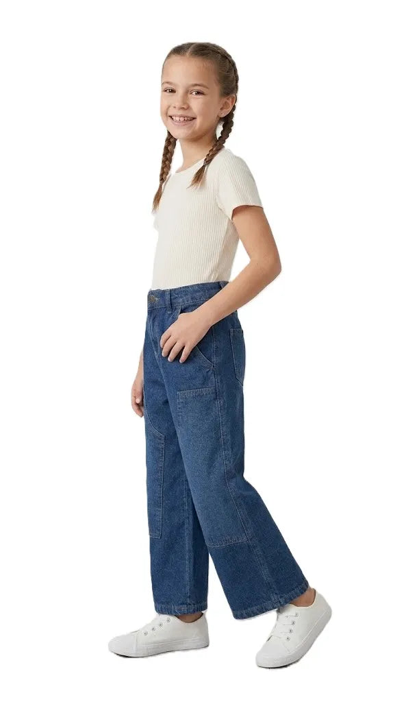 Close-up of the large front patch pockets on TREE's girls' blue pants