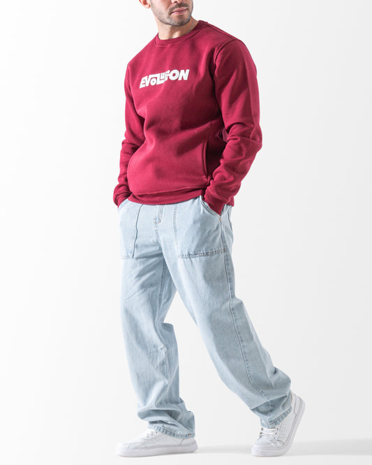 Men's maroon crew neck sweatshirt with white Evolution print standing pose