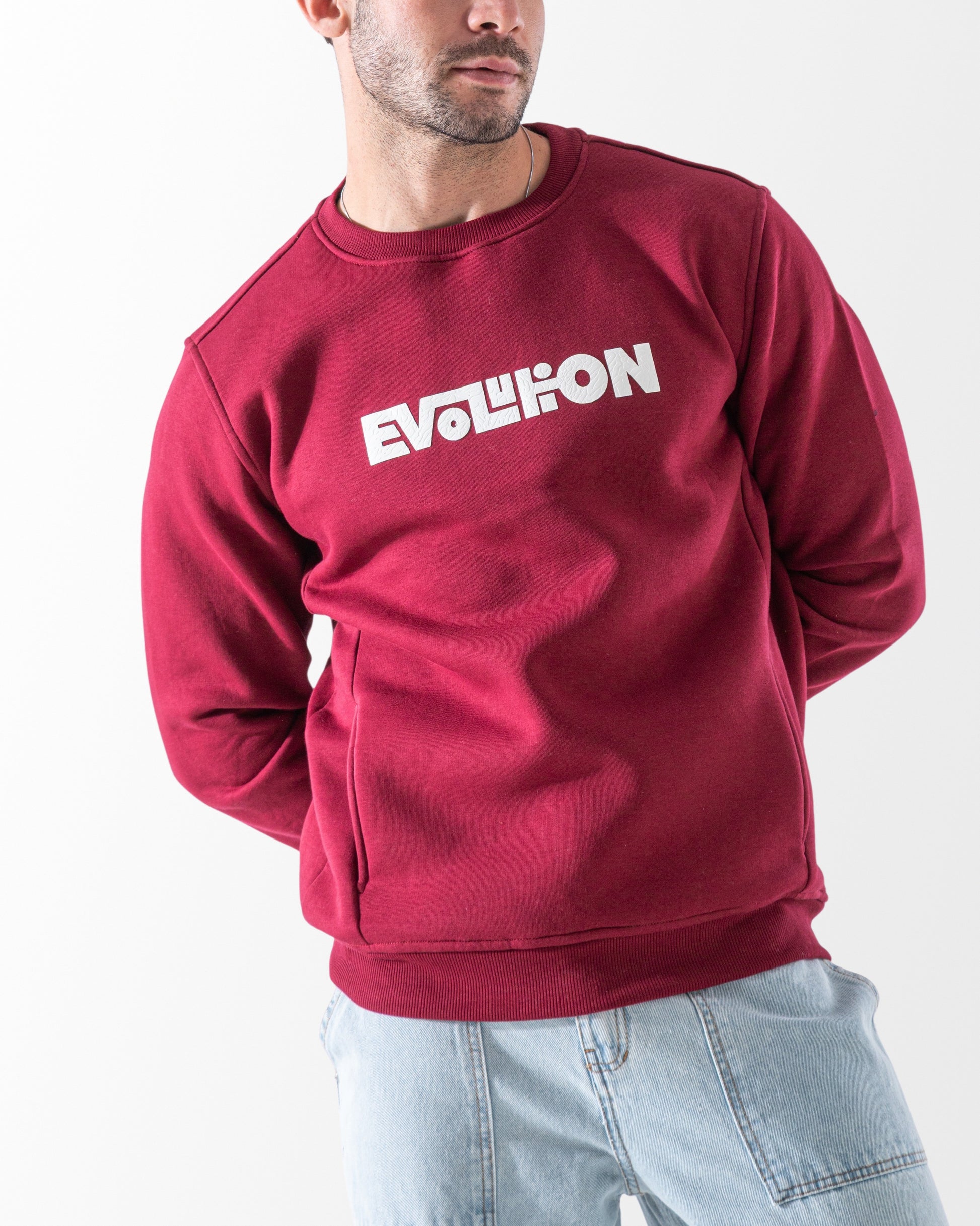 سويت شيرت رجالي لون نبيتي خامة ميلتون ياقة دائرية مطبوع عليه كلمة Evolution