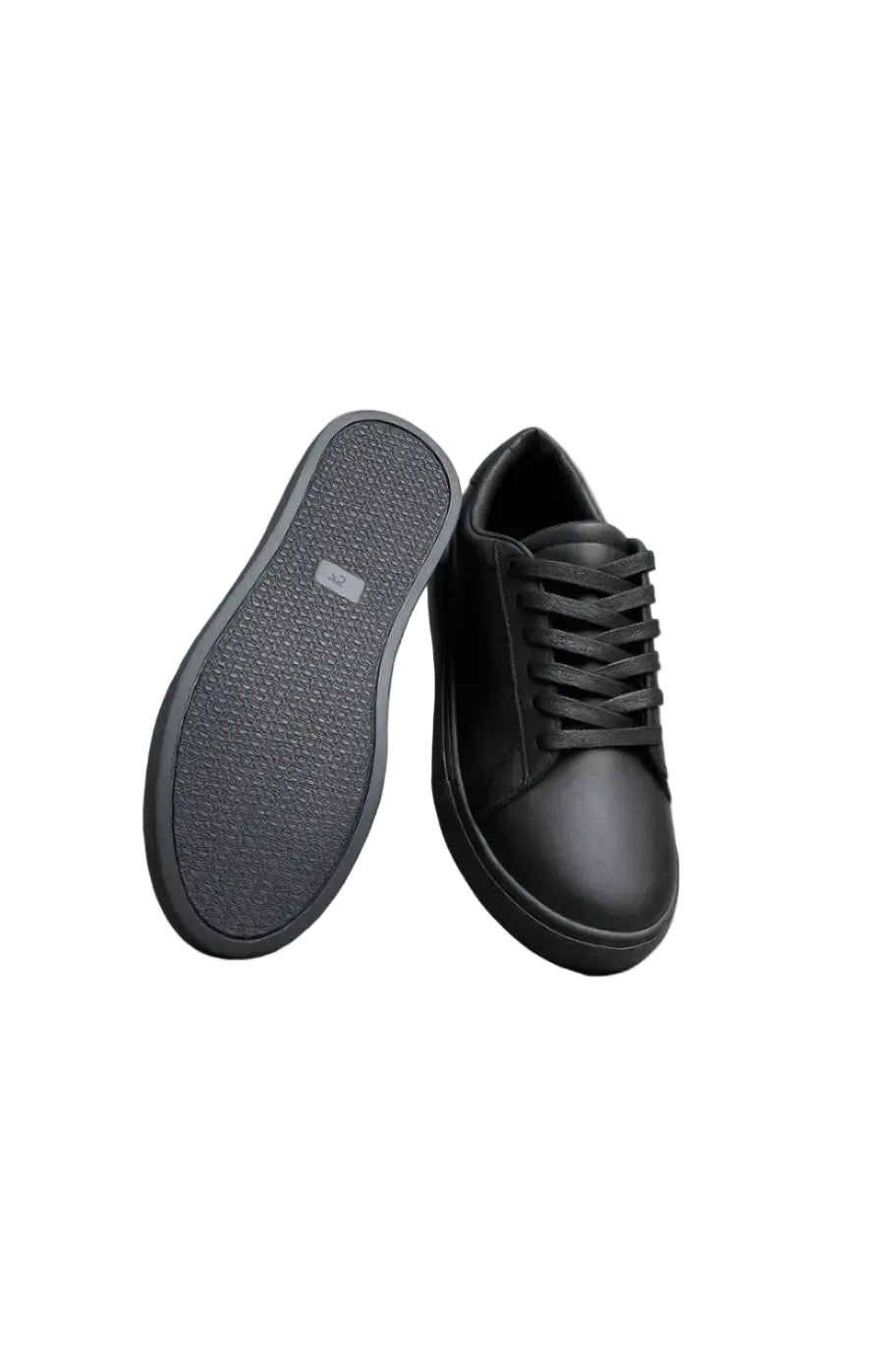 View of kids' all-black casual sneakers by TREE showing the anti-slip bottom sole and sleek upper design.