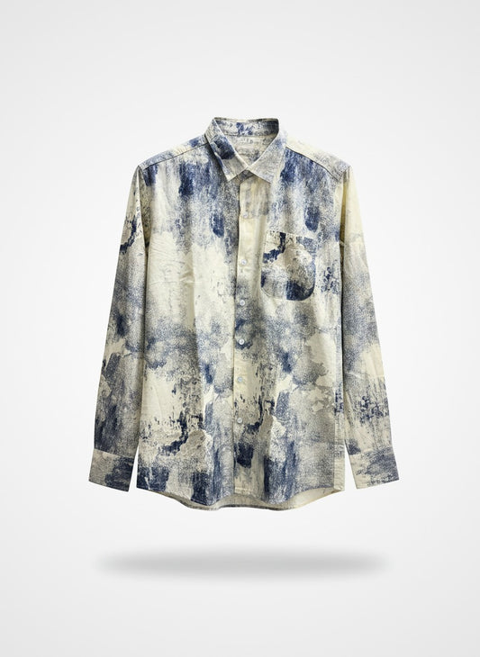 Long-sleeve shirt with abstract blue and beige pattern on a light gray background