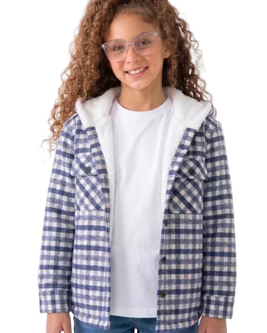 A young girl with curly brown hair and clear glasses is wearing a blue and white gingham plaid hooded jacket over a white t-shirt and blue jeans, photographed against a plain white background.