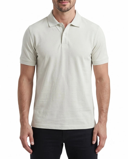 Front view of a man wearing an off-white piqué polo shirt featuring a regular fit by TREE.